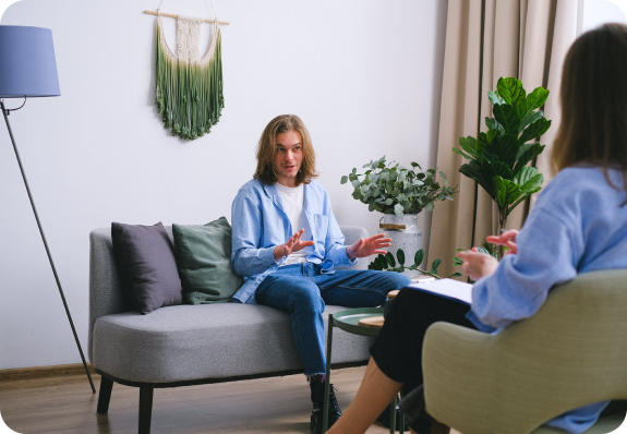 man explaining problems to faceless psychologist 7176030